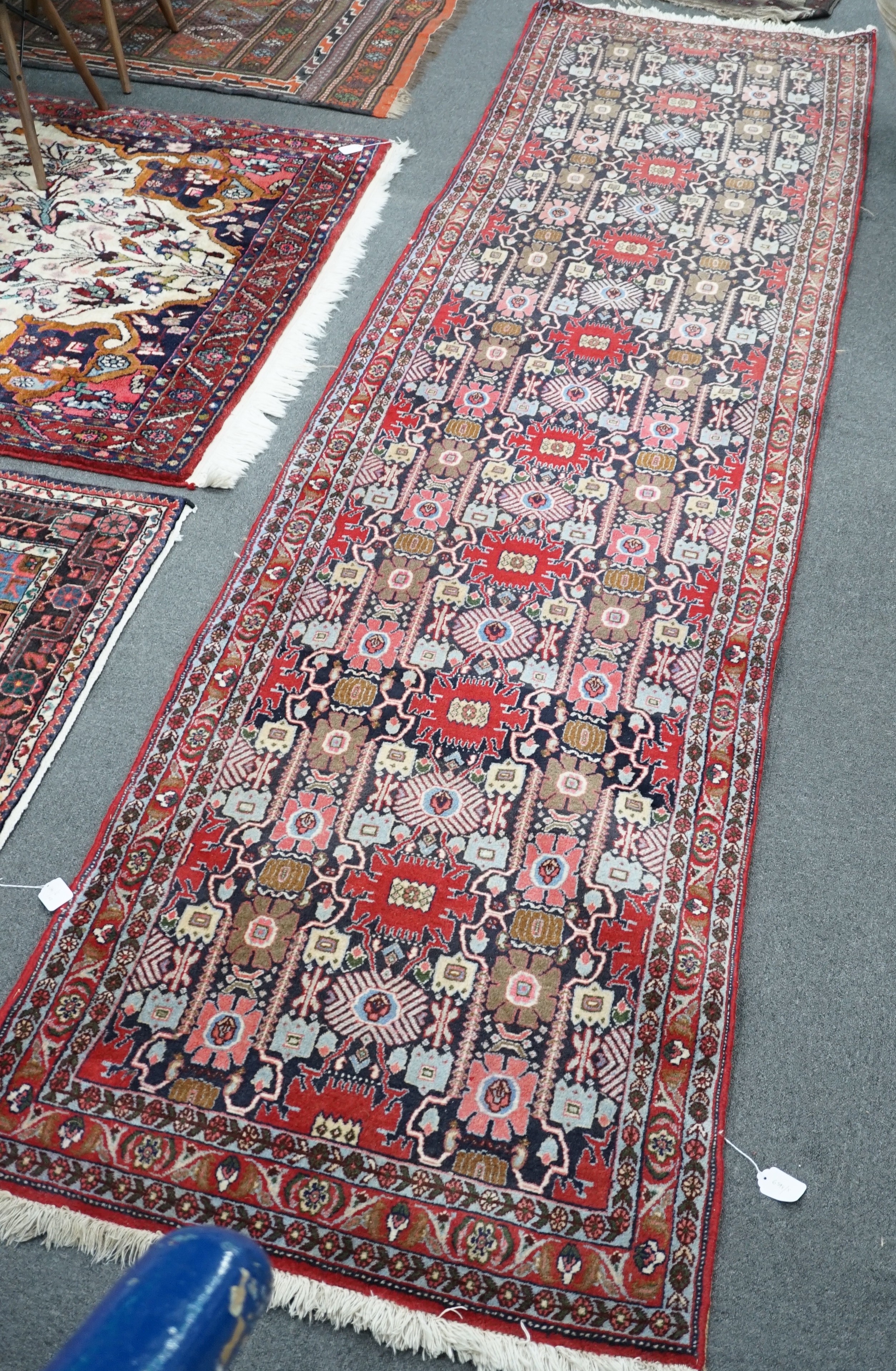 A North West Persian blue ground geometric runner 390cm x 88cm